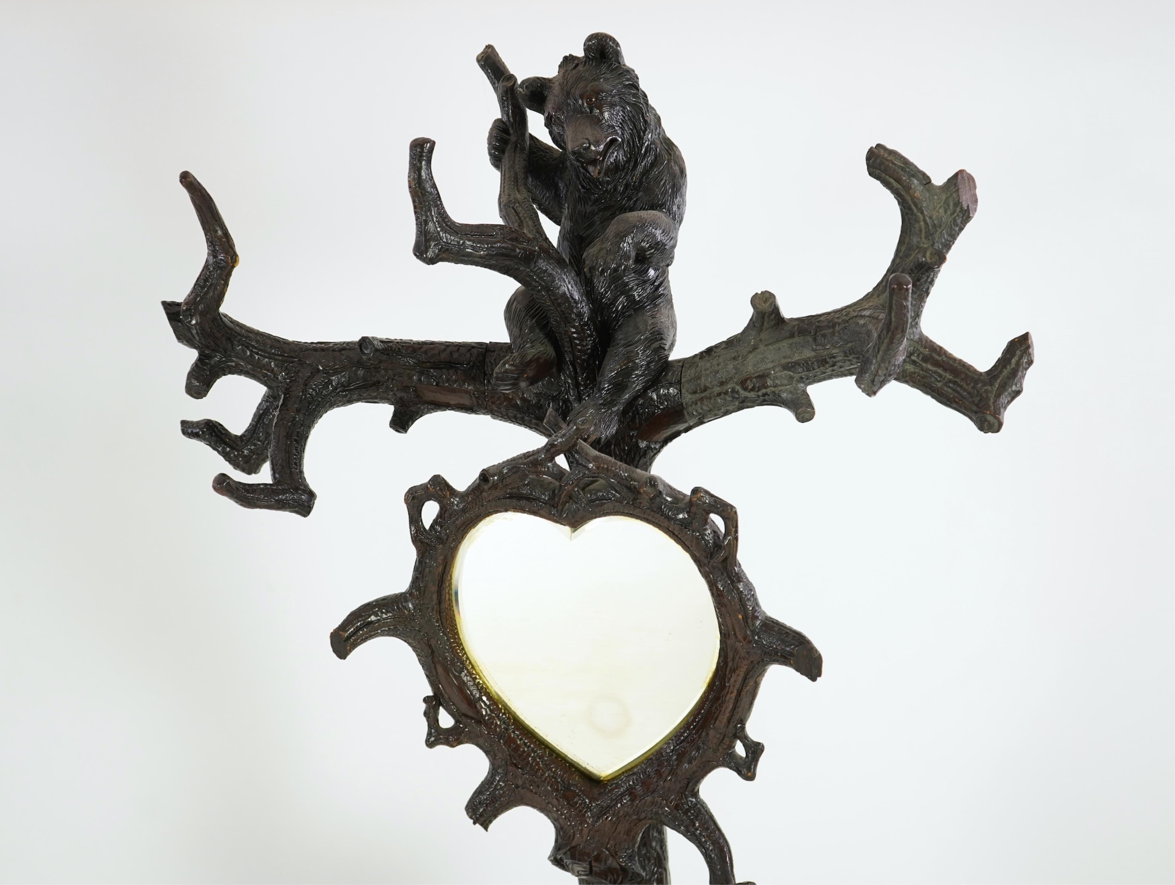 A late 19th century Black forest carved bear hallstand